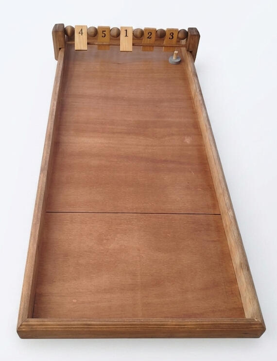 Jeu du palet clapet Jeu du palet clapet